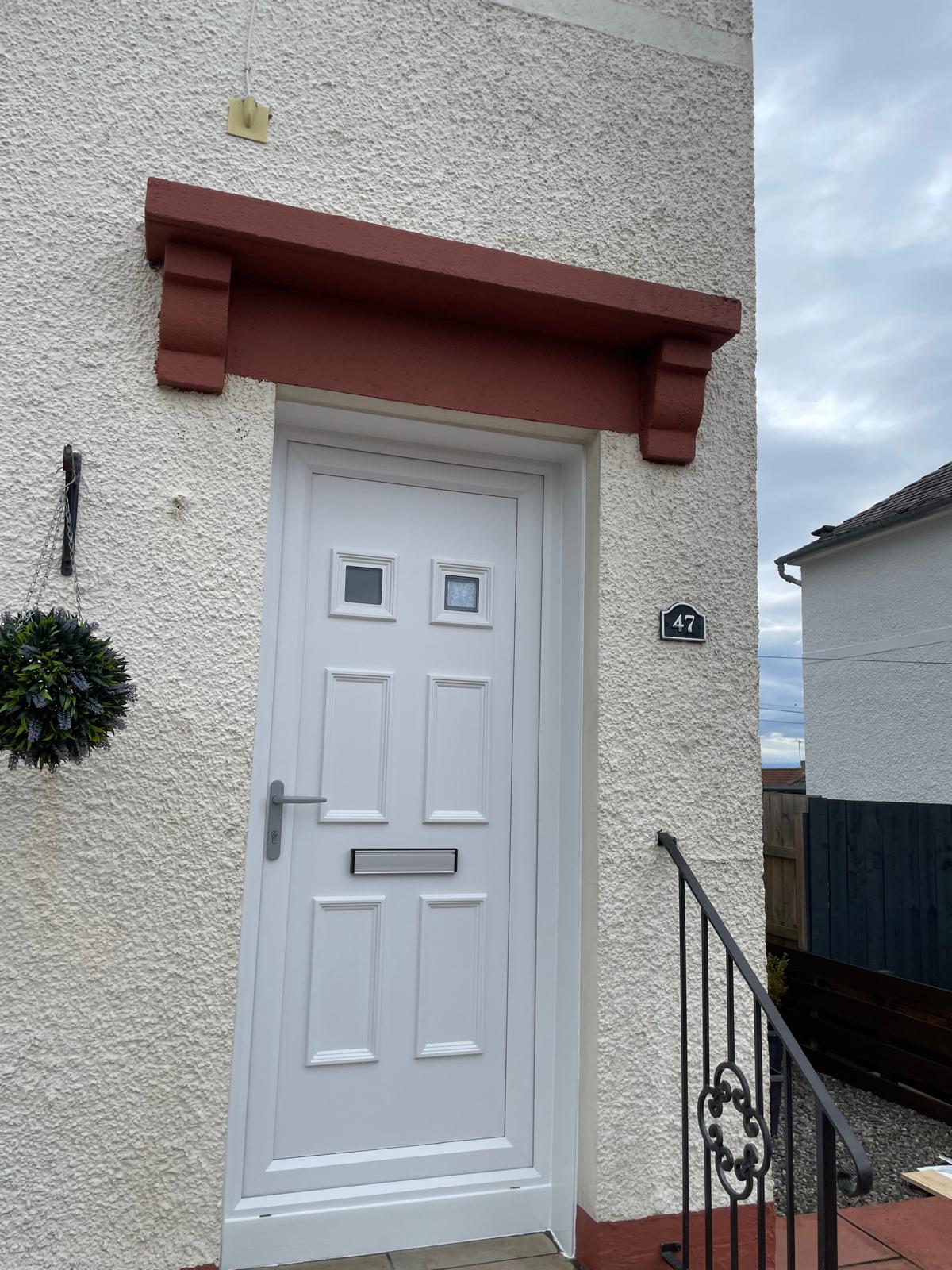 Newly hung external door with clean trim and a precise reveal.
